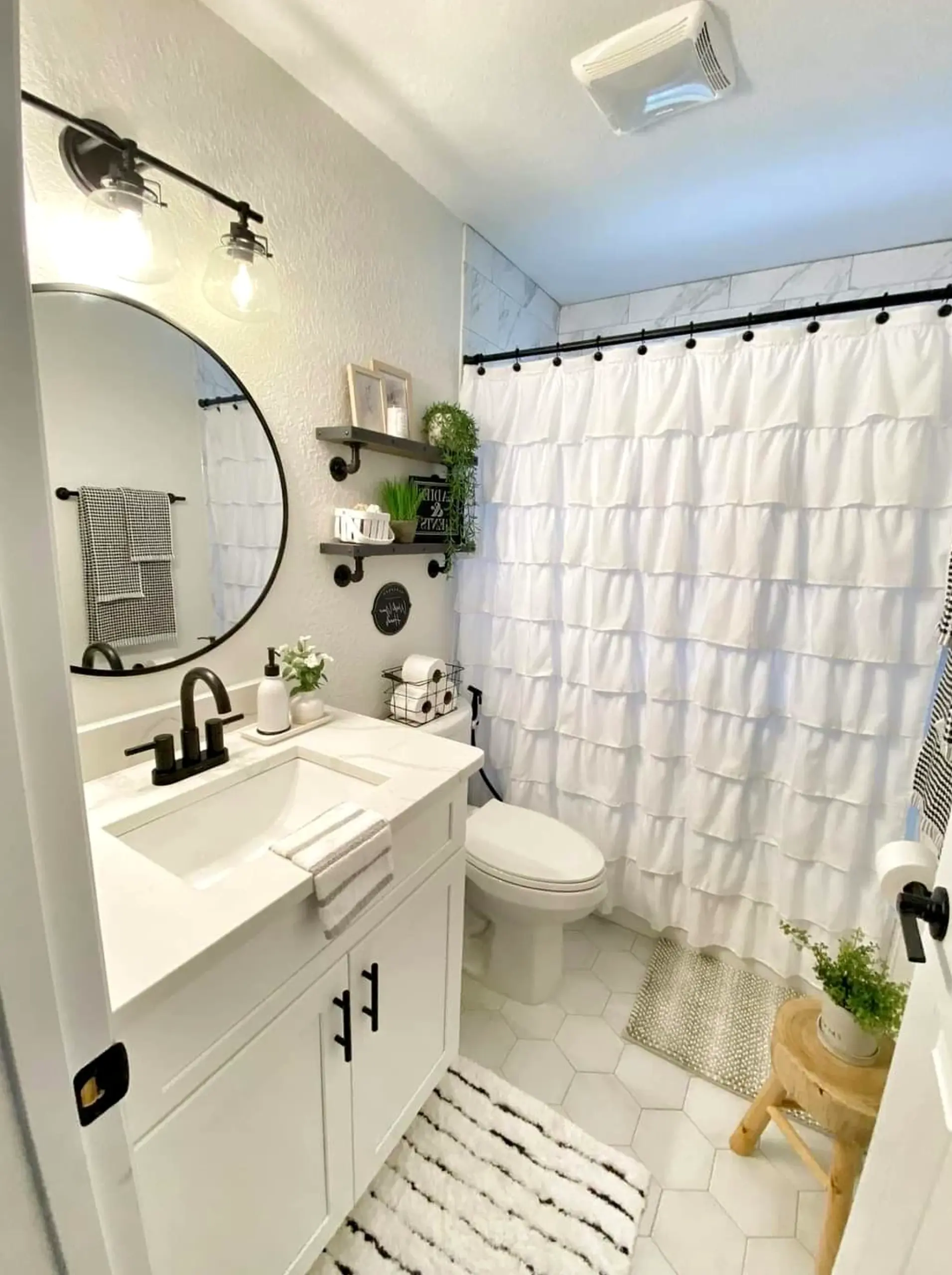 Graceful decorative mirror frames the backdrop with order, making the scene feel easy to enjoy.