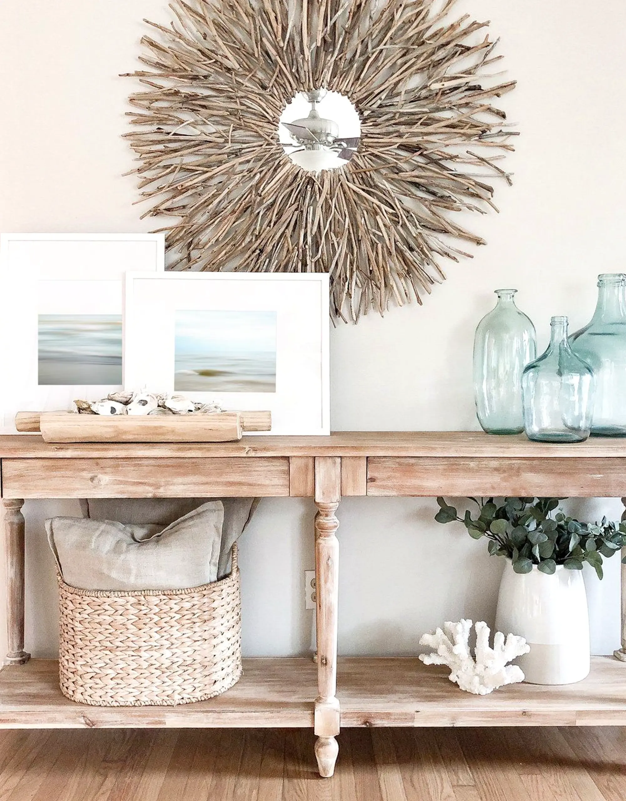 Sunny vase display introduces shape into the design, keeping the atmosphere clear and inviting.
