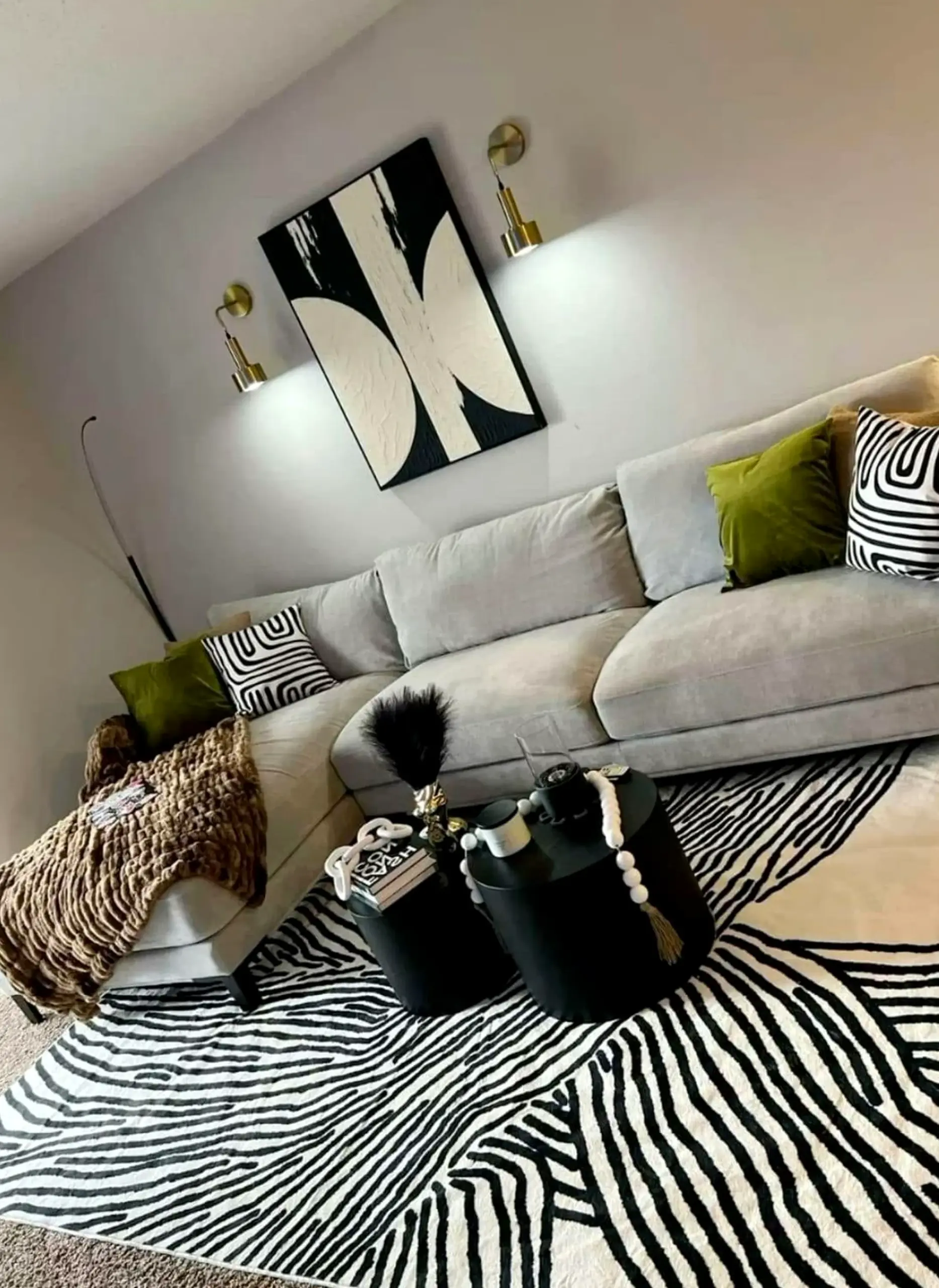Simple window seat brings detail to the wall, creating a mood that feels settled and welcoming.