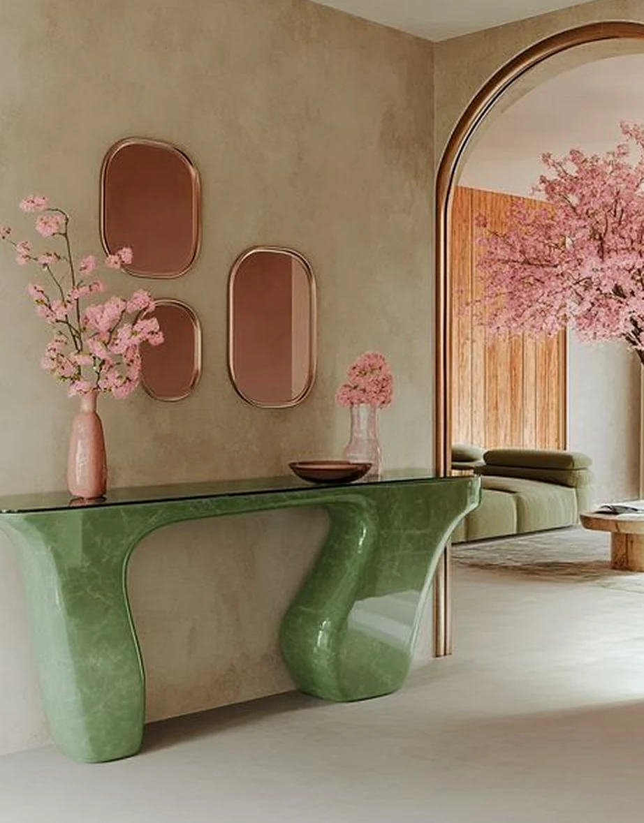 Warm vase display brings personality to the sitting area, creating a mood that feels warm without clutter.