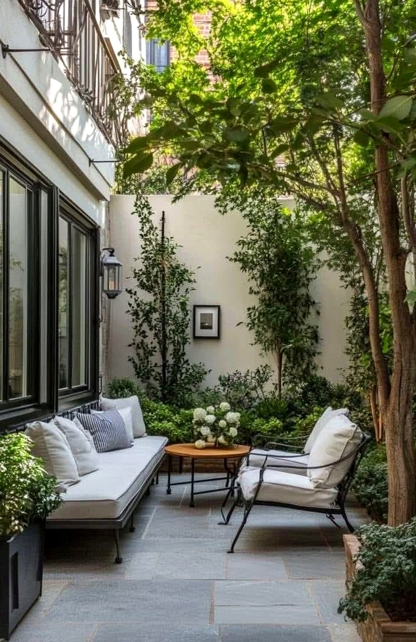 Elegant wood shelving supports the outdoor space through contrast, leaving the space feeling visually grounded.