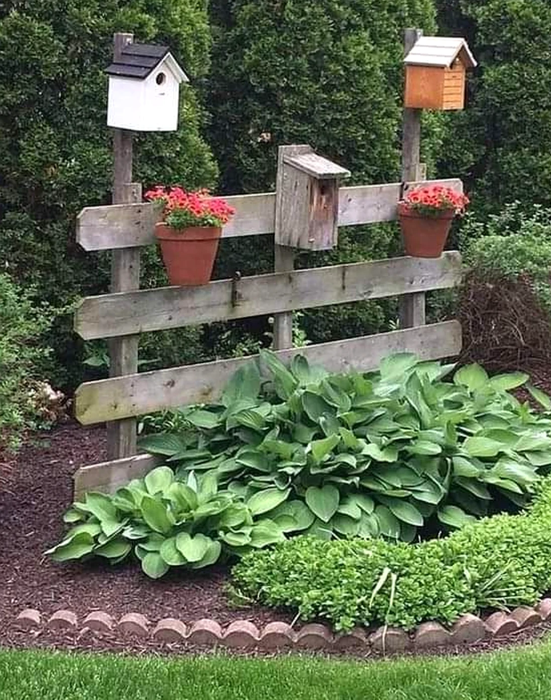 Calm stone path frames the corner with texture, making the scene feel soft at the edges.