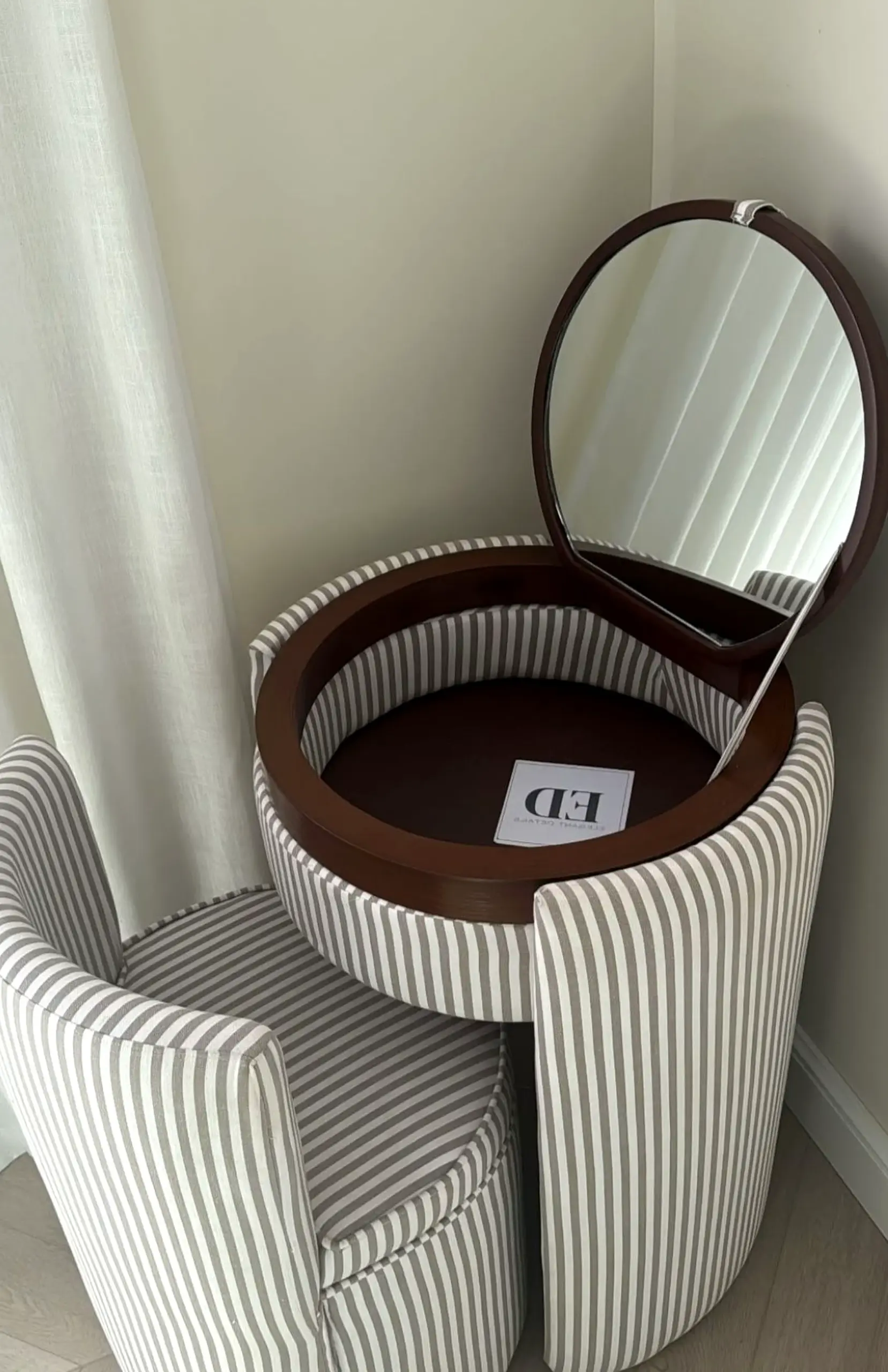 Simple floral bed anchors the sitting area with personality, giving the view a mood that feels clear and inviting.