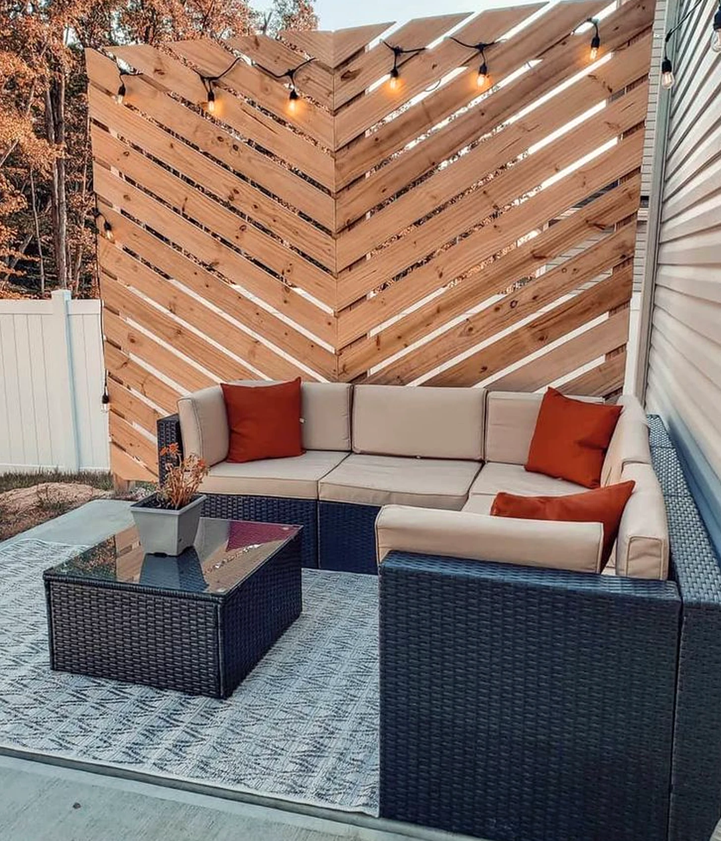 Balanced sunlit room introduces shape into the garden edge, keeping the atmosphere personal and relaxed.