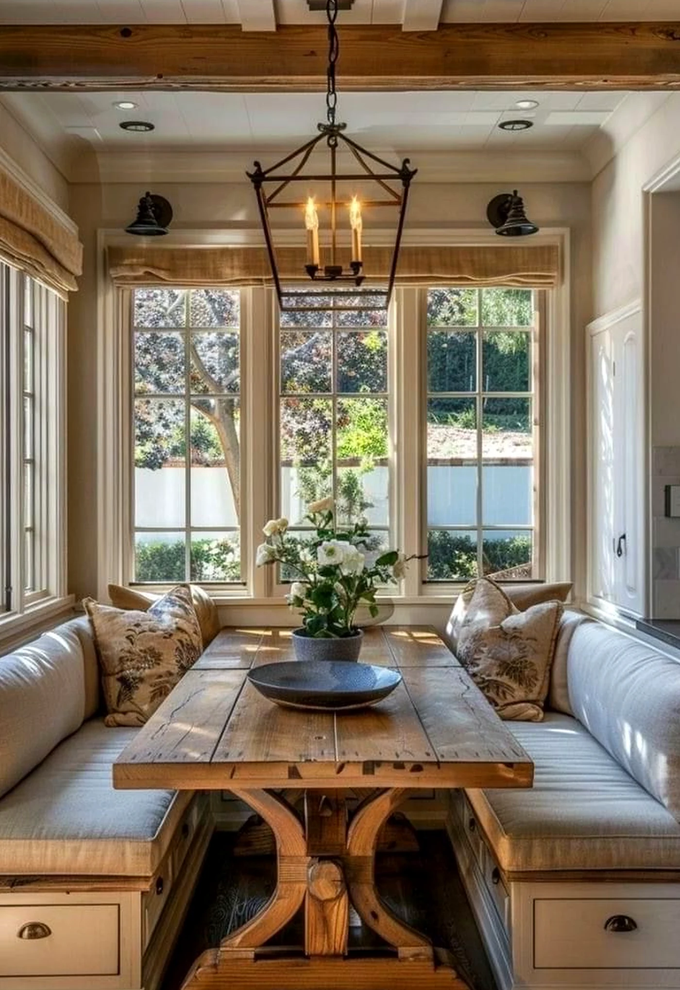 Earthy linen bedding frames the entry with warmth, making the scene feel bright but not busy.