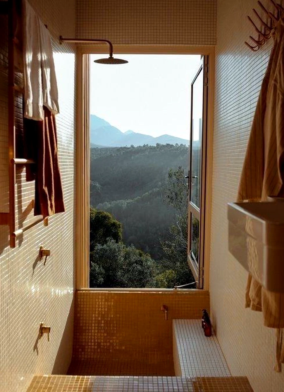 Elegant balcony scene supports the table through detail, leaving the space feeling quietly finished.