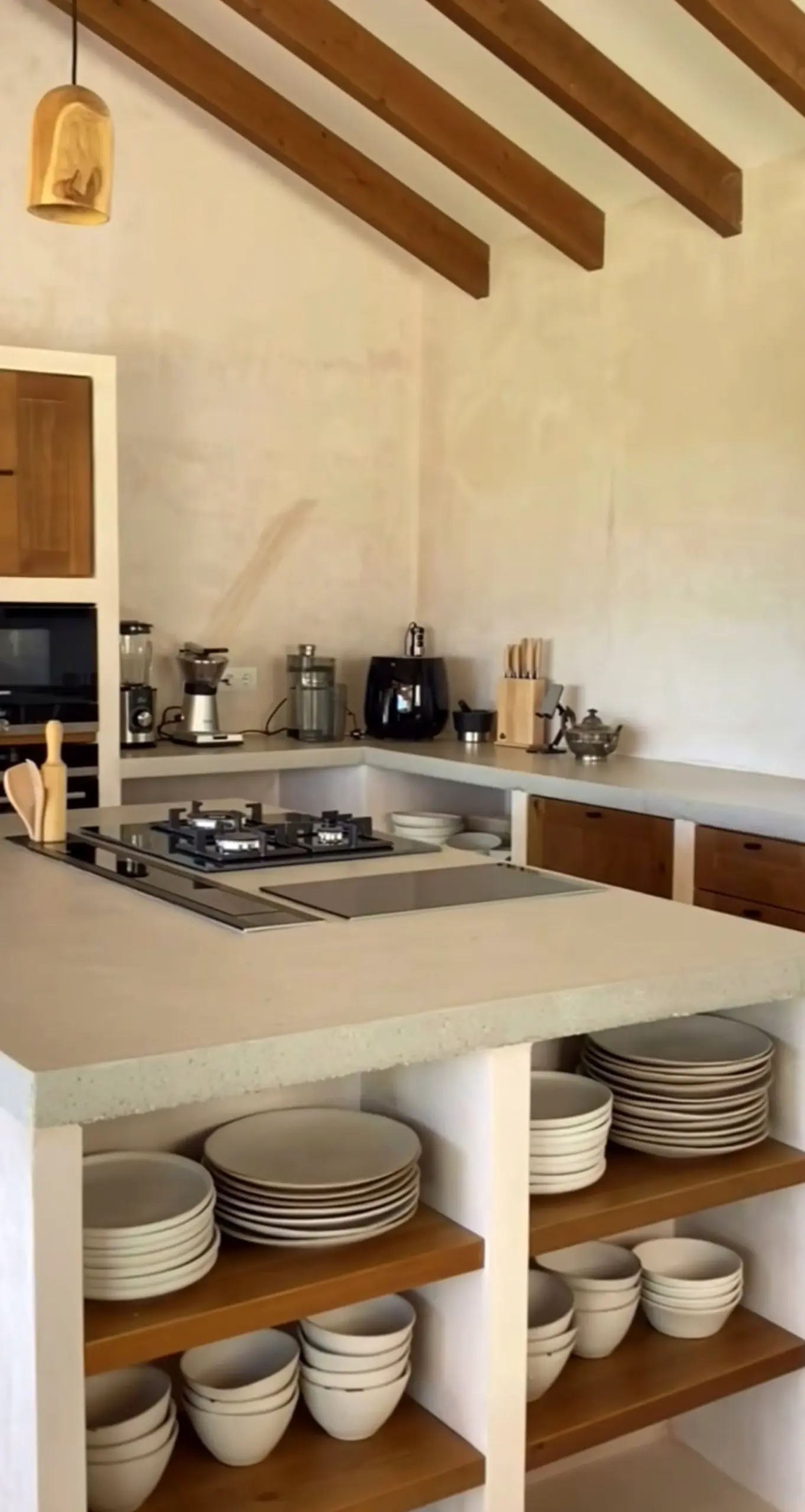 Natural kitchen nook brings a useful note of comfort, making the wall feel ready for quiet use.
