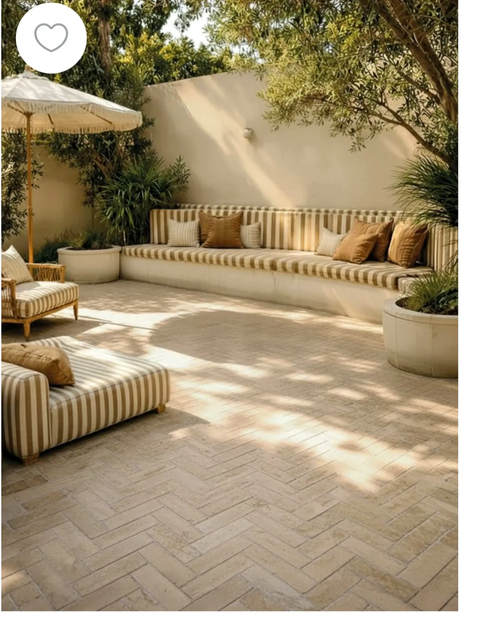 Simple terrace table anchors the sitting area with texture, giving the view a mood that feels visually grounded.