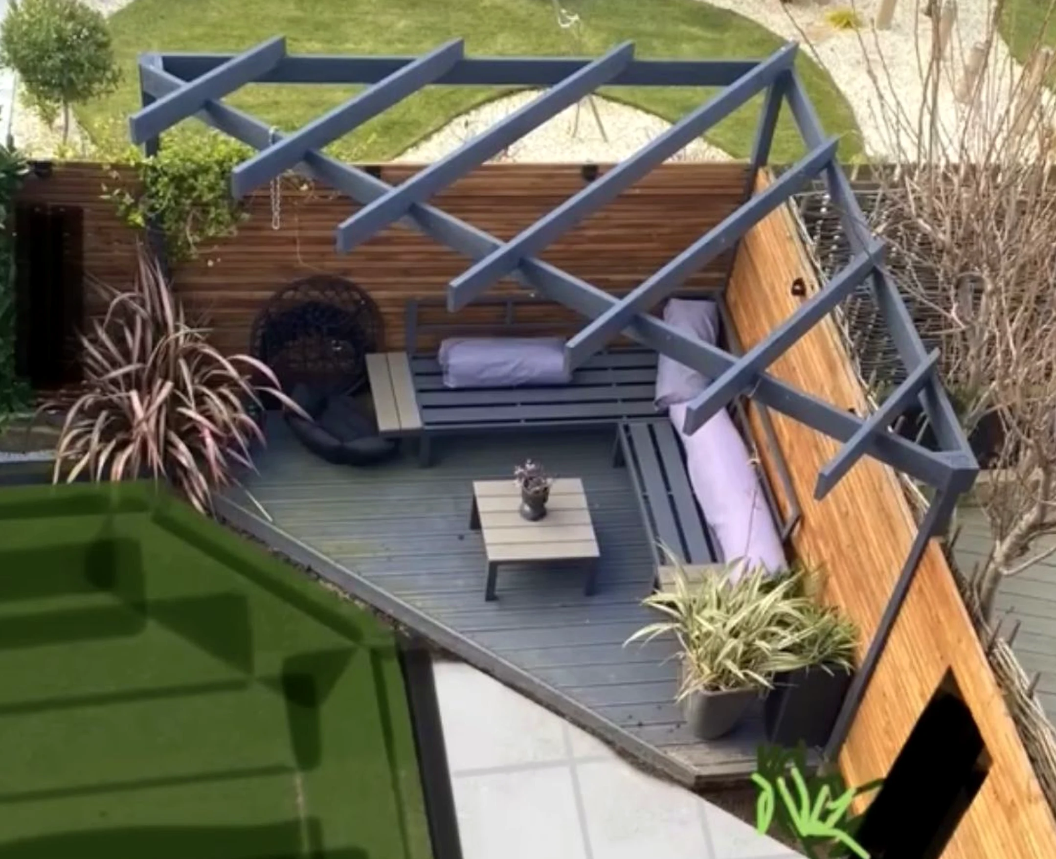 Airy wooden deck adds a clear layer of shape, helping the design feel personal and relaxed.